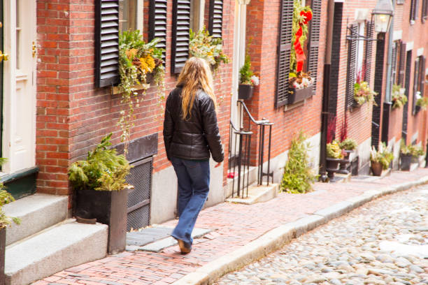 istock Woman walking in Beacon Hill, Boston 1195876430