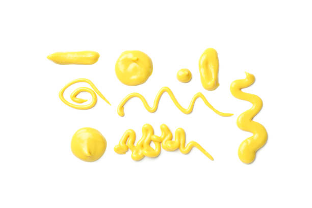 Set of different yellow sauce smears isolated on white background