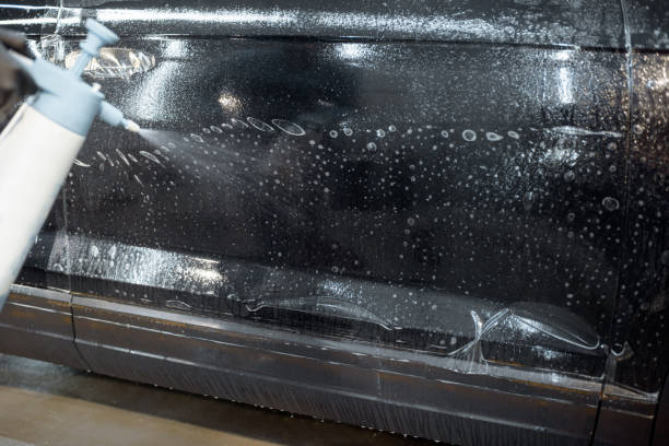 istock Preparing vehicle body before protective film apply 1195886227