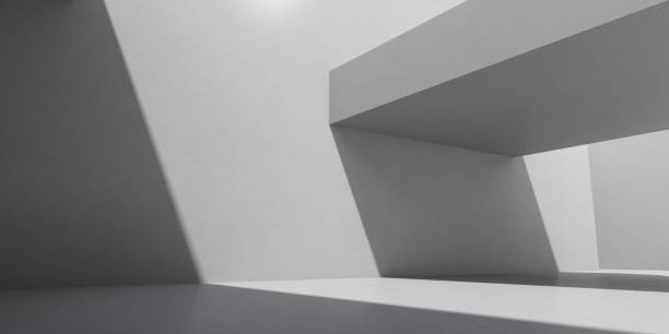 istock Abstract of concrete interior space with sun light cast the shadow on the wall and floor,Geometric structure design,Perspective of brutalism  architecture,3d rendering. 1195890569