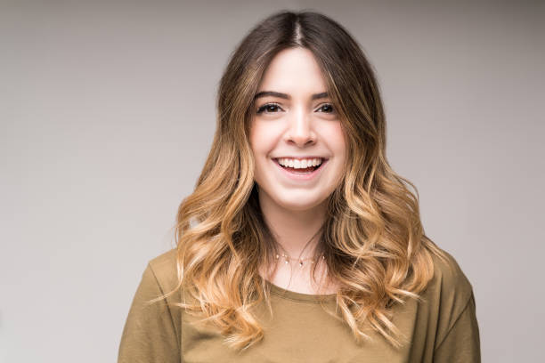 istock Happy Caucasian Female Making Eye Contact In Studio 1195891277