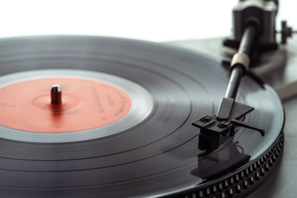 istock Turntable vinyl record player. The tonearm on a vinyl record. 1195892118
