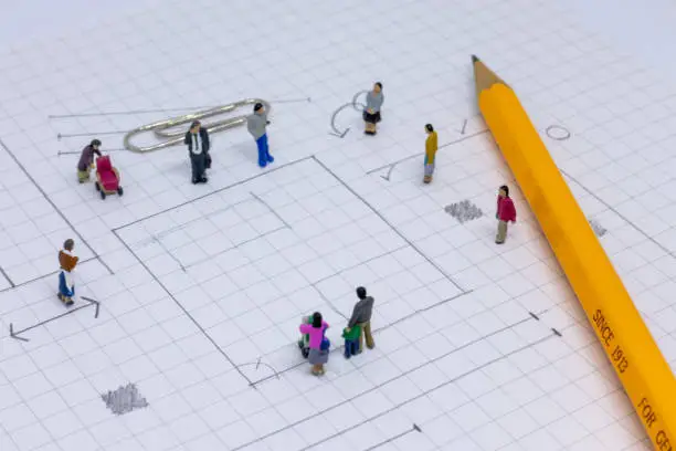 Miniature dolls and grid paper