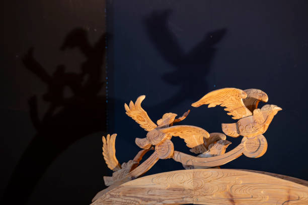istock birds and shadows flying from wood 1195902793