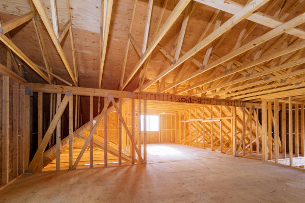 istock Interior of attic room with under reconstruction installing wooden frame for improvement 1195903019