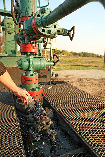 istock Oil wells with polluted ground 119591094