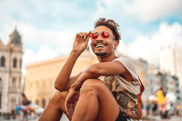 Afro street fashion style model Afro man at Marco Zero in Recife city in Pernambuco state, Brazil street style stock pictures, royalty-free photos & images