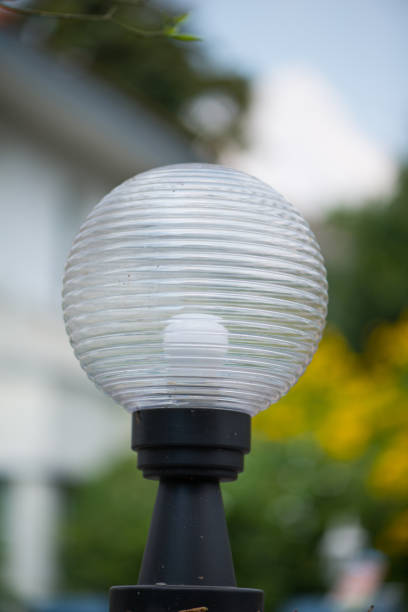 istock Closed up lamp in front of house 1195912160