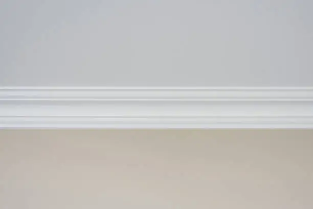 Detail of a flat ceiling skirting, ceiling moldings in the interior