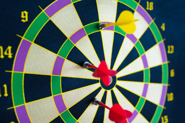 istock Darts close-up, Dartboard with arrows. 1195914154