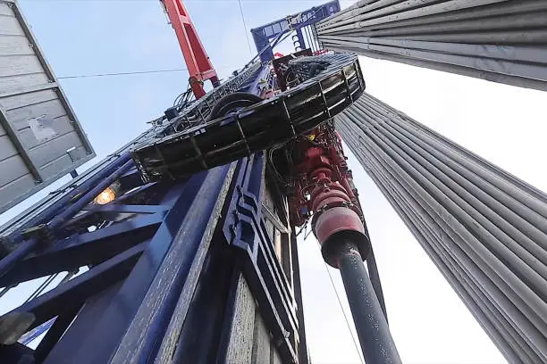 Photo of Drilling rig, equipment at site of oil drilling.