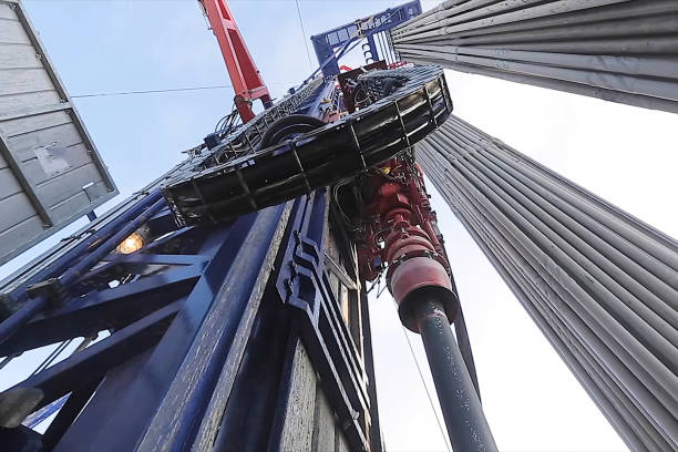 drilling rig, equipment at site of oil drilling. - derrick crane drilling rig well sky imagens e fotografias de stock