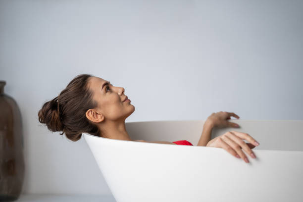 istock Lovely relaxed young Caucasian woman looking up 1195914321