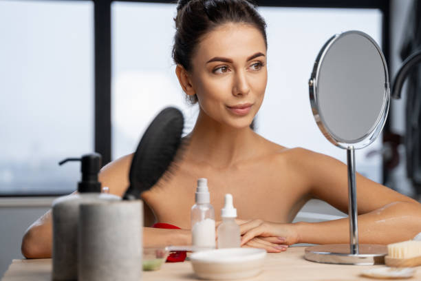 istock Pretty girl sitting at a dressing table 1195914325