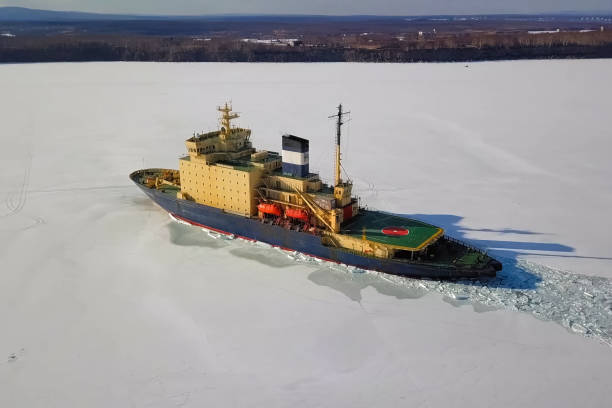 istock Ice-enpalled naldo, ice breaking ship. 1195915380