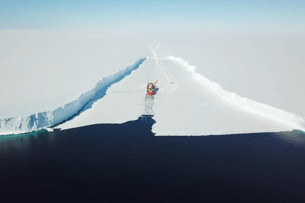 Ice-enpalled naldo, ice breaking ship. stock photo