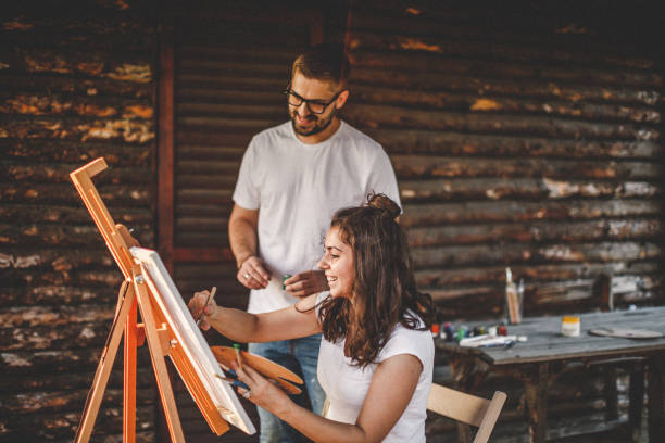 istock Painting with you is funny 1195916175