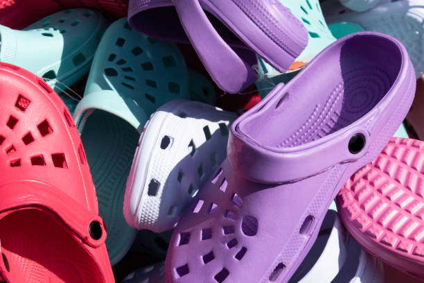 istock Different colored rubber shoes in a sales chute 1195916558