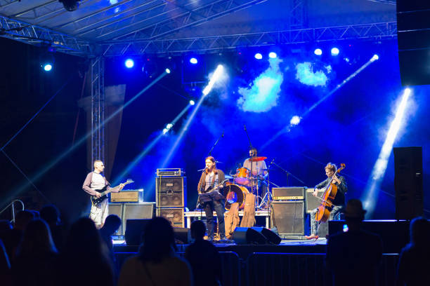 istock Rock band playing on the concert 1195918752