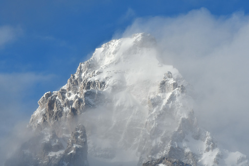 snow covers the peaks of the Grand Teton Range in Wyoming