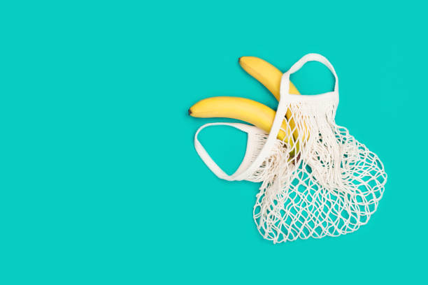 istock Bananas in eco bag with copy space 1195921819