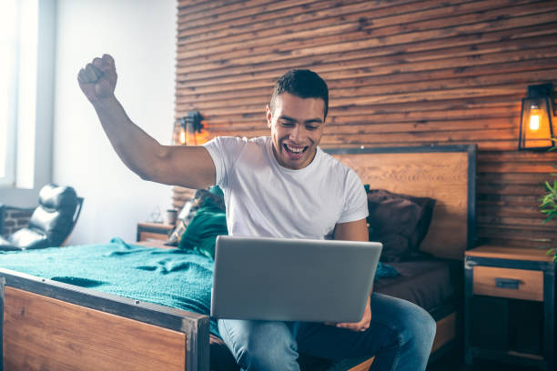 istock Young dark-haired man in jeans feeling amazing 1195922543