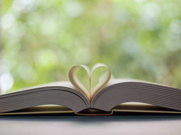 istock Heart shape made from book pages 1195922563