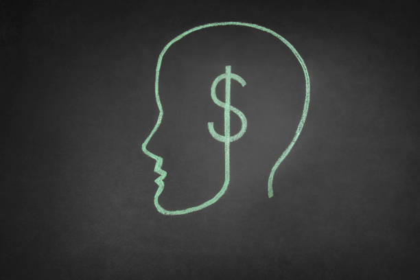 Human head drawing with dollar sign on blackboard with copy space