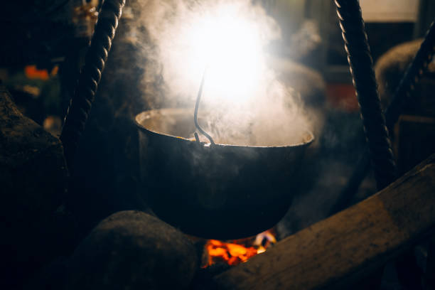 istock Cooking and deep frying in fatiscent big pan or wok 1195936670