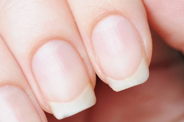 istock macro nail clear manicure and clean cuticle 1195938285
