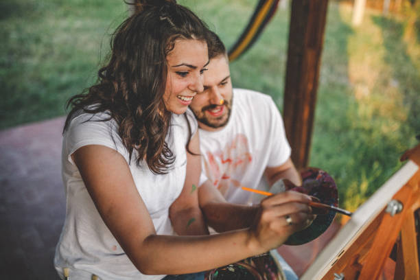 istock Painting with you is funny 1195939038