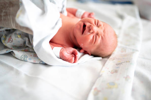 istock Newborn crying at the hospital 1195939616