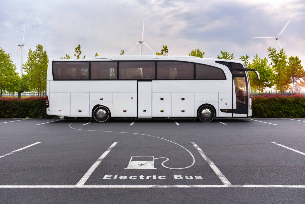 Electric bus on charging stock photo