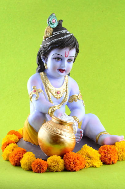 istock Hindu God Krishna on green background 1195944688