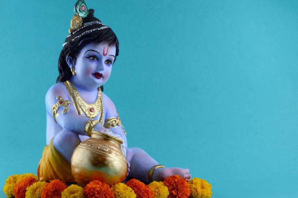 istock Hindu God Krishna on blue background 1195945668