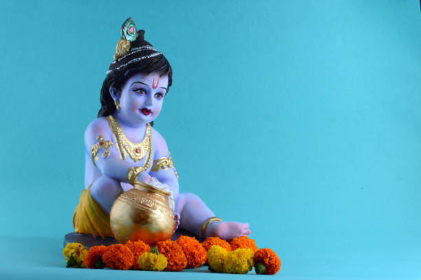 istock Hindu God Krishna on blue background 1195945829