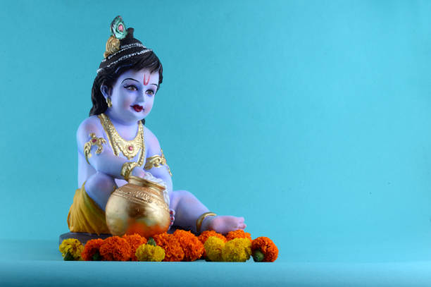 istock Hindu God Krishna on blue background 1195946426