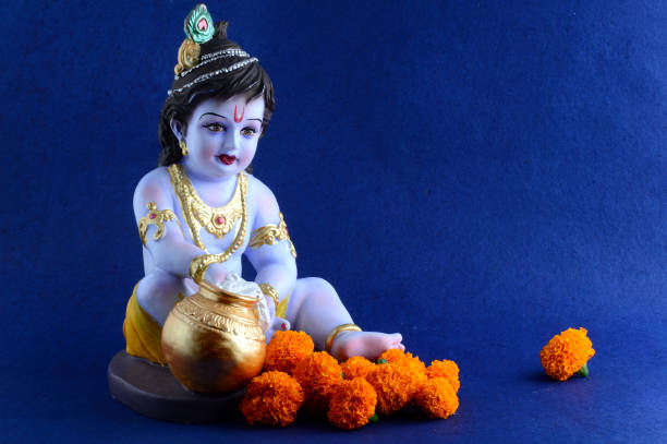 istock Hindu God Krishna on blue background 1195946507