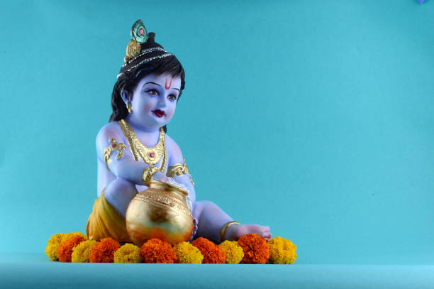 istock Hindu God Krishna on blue background 1195947276