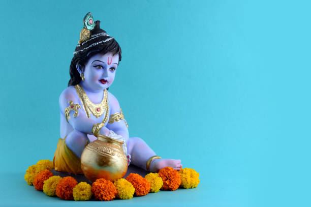 istock Hindu God Krishna on blue background 1195947362