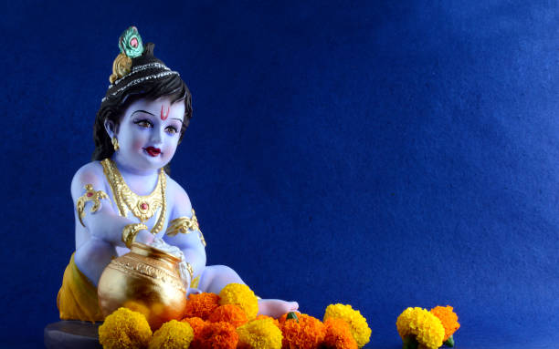 istock Hindu God Krishna on blue background 1195948033