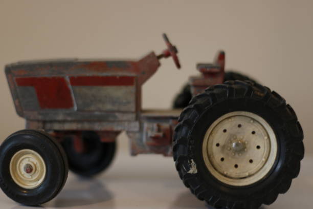 istock Tractor model. Scale model of traditional Farm Tractor 1195949400