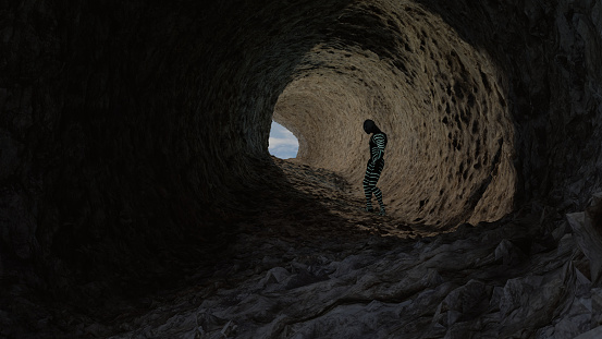 3d Illustration of a reptilian humanoid exploring a cave