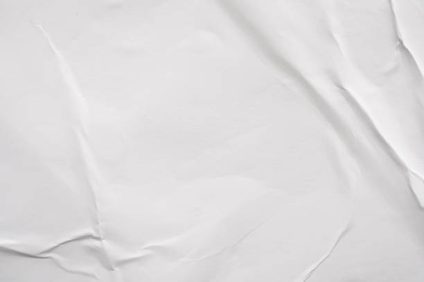 Blank white crumpled and creased paper poster texture background