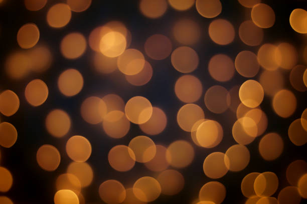 istock Abstract blur golden bokeh light Christmas holiday background 1195952964