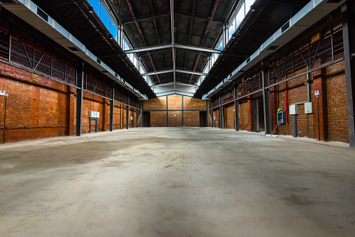 Unmanned, industrial style old warehouse building space.