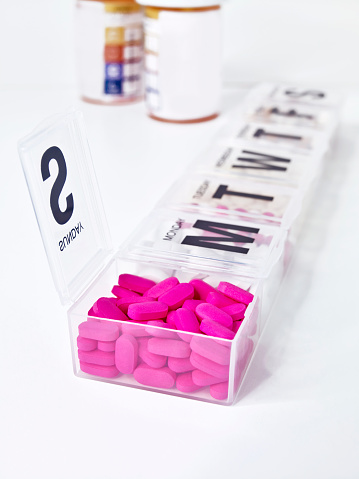 Weekly plan pill box and pills
