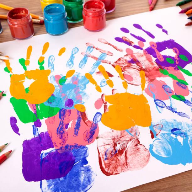 istock Handprints and art equipment 1195960809
