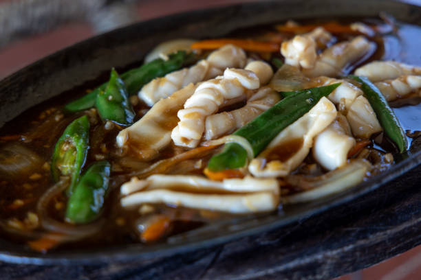 istock Filipino style sizzling squid 1195962678