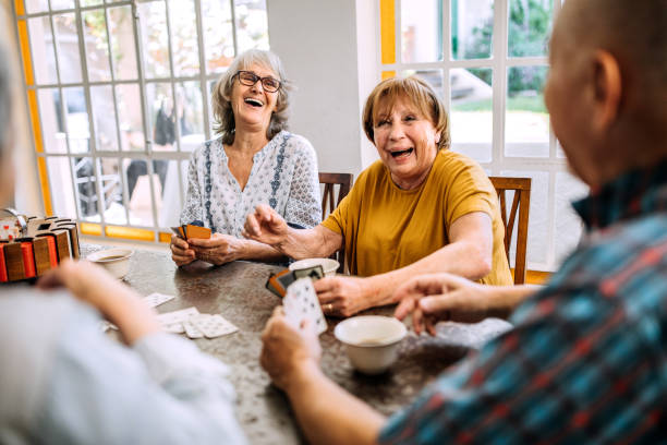 istock Young at heart seniors having fun time in nursing home 1195963422